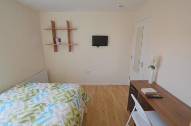 16 Fifth Avenue Purple Bedroom.JPG