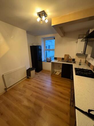 Bright kitchen with ample floor space...