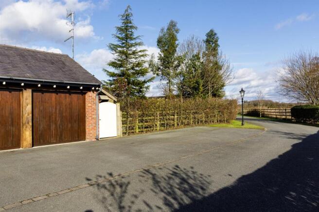 Double garage and pa