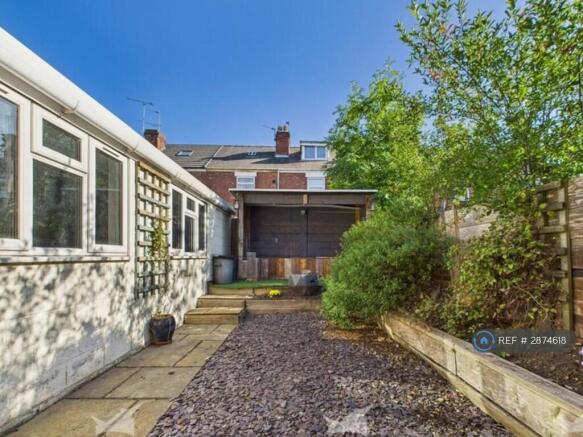 Garage/ Utility And Garden