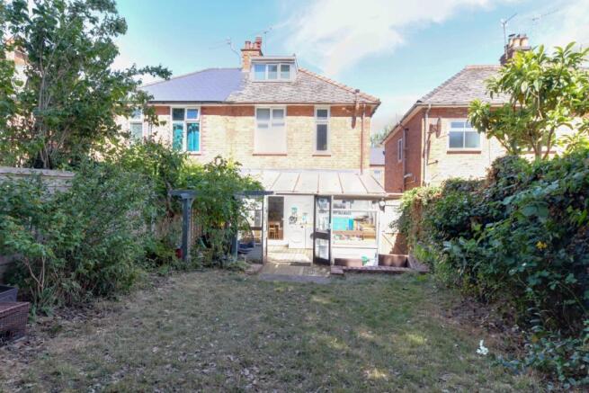 rear of house- mid garden shot
