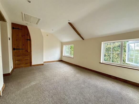 bedroom one with rear aspect.JPEG