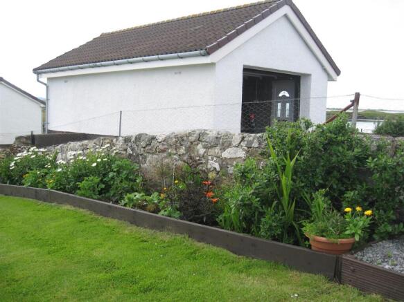Garage and flowers.JPG