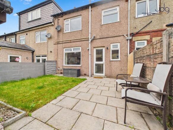 A Sunny South East Facing Garden With Rare Garage Space