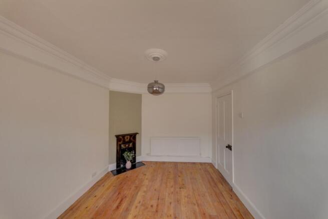 wood floors and feature fireplace