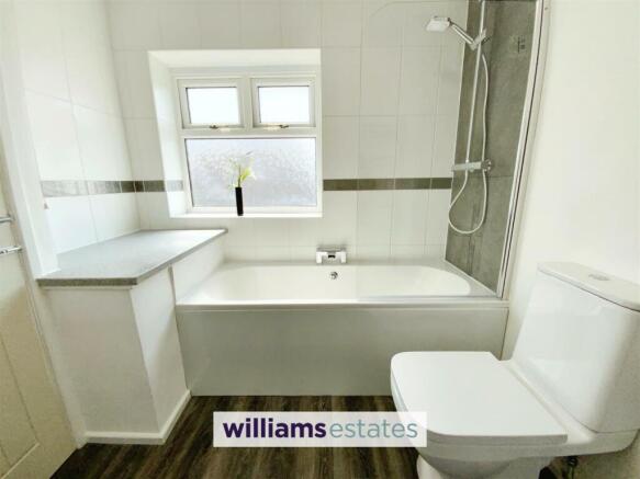 bath with shower over