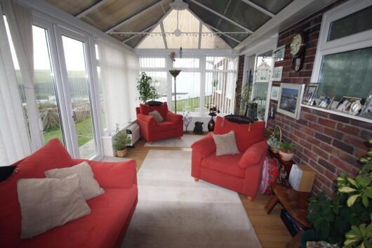 LIVING ROOM/CONSERV
