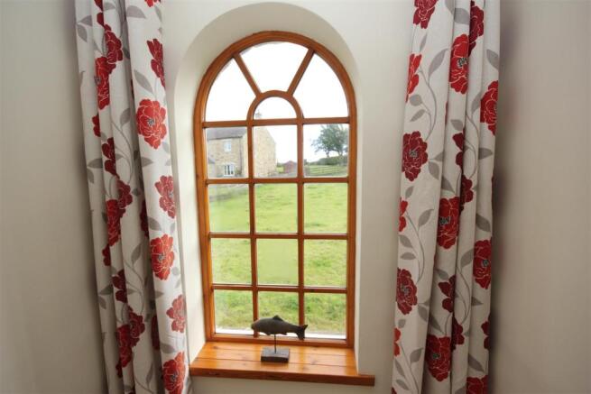 Arched stair window.JPG