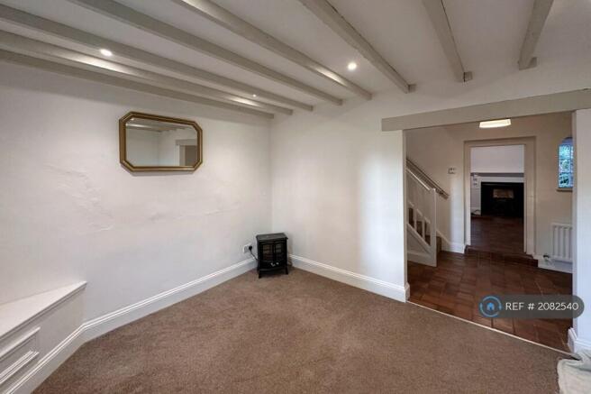 Living Room Looking Through To Spacious Hallway