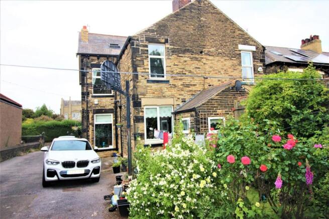 Charming stone house with lush flowering garden...