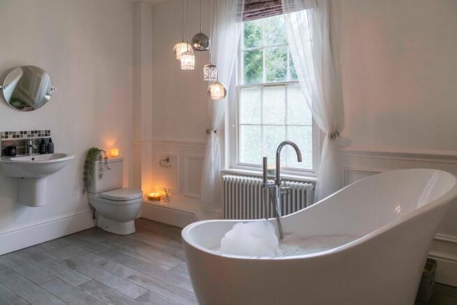Family bathroom with underfloor heating
