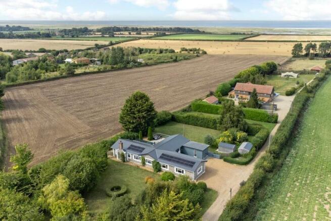 Elegant home with sweeping coastal farmland views