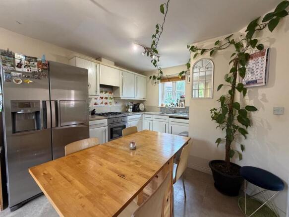 Spacious kitchen with large dining table...