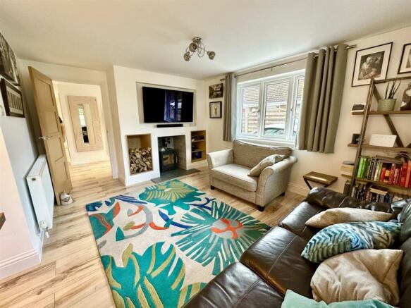 lounge with woodburner.JPEG