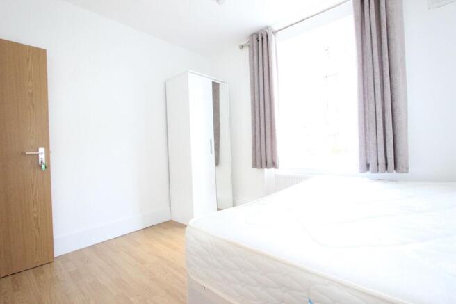 Bright double bedroom with modern furniture...