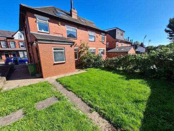 Bright and well-maintained garden space with lu...