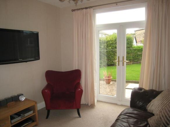 Family / Dining Room With Doors To Garden