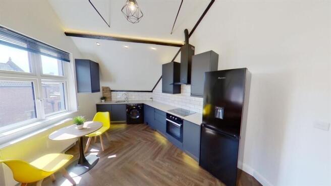 Modern stylish kitchen with bright dining area...