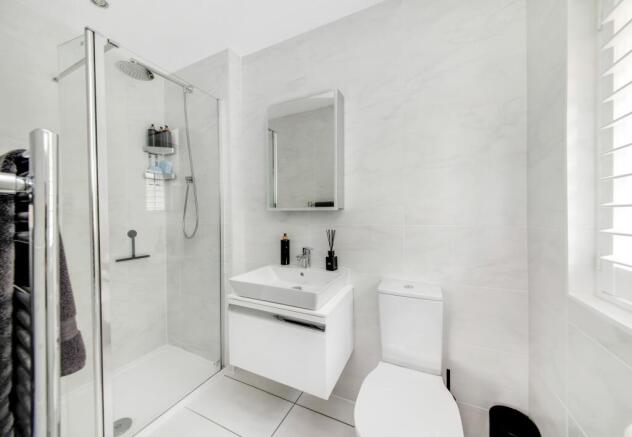 BEDROOM ONE EN-SUITE SHOWER ROOM