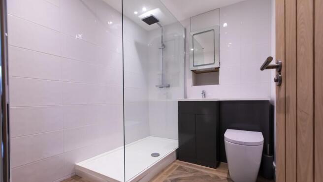 Contemporary tiled bathroom with large walk-in ...
