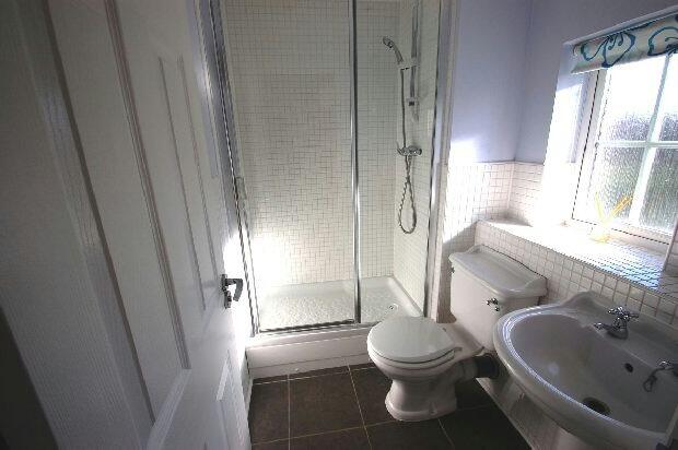 EN-SUITE SHOWER ROOM