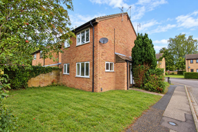 Sunny Brick Corner House in Quiet Suburbia.png