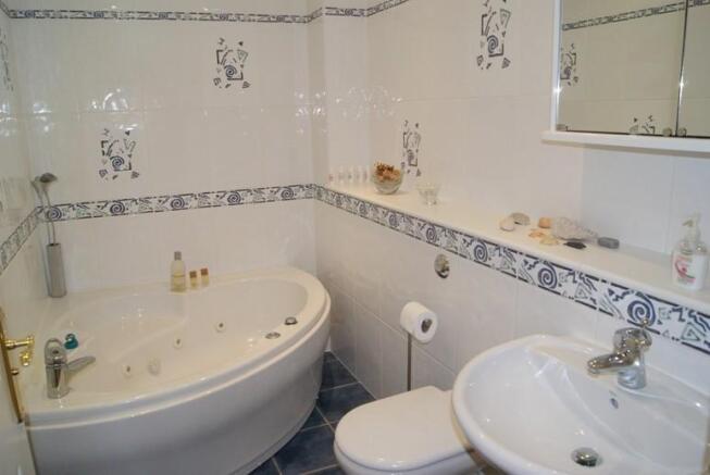 1 OF 2 BATHROOMS