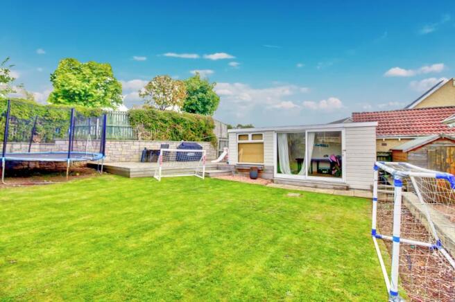 Rear Garden And Summer House