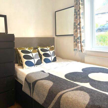 Bright, neatly presented double bedroom with a ...