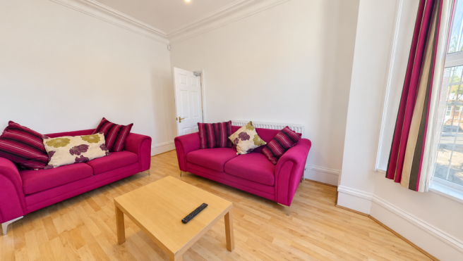 Bright Fuchsia Living Room with Bay Window