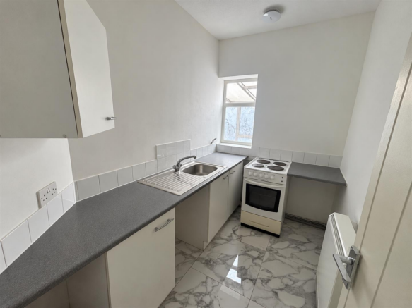 Clean Minimalist Galley Kitchen.png