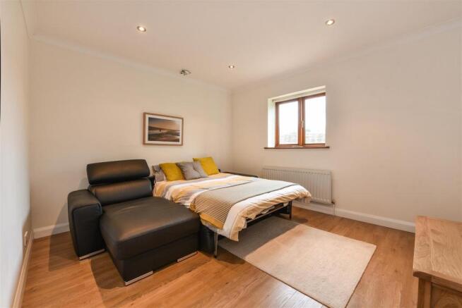 TV Room/Bedroom 4