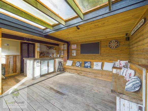 Covered Patio Area And Bar