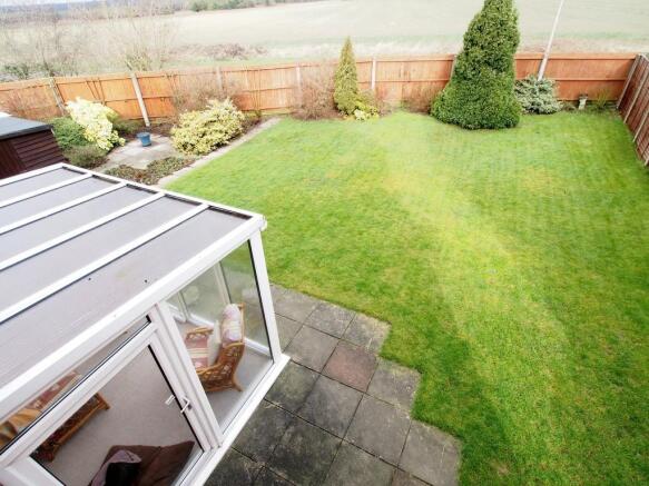 Rear garden with field views beyond