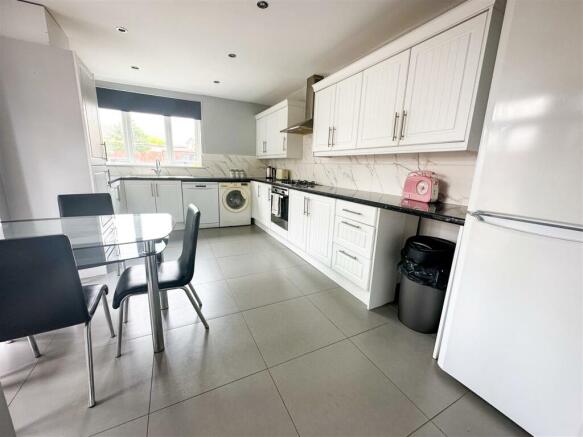 ALTERNATE VIEW OF KITCHEN/BREAKFAST ROOM