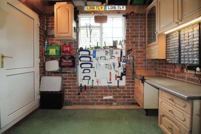 Workshop area to the rear of garage (2).JPG