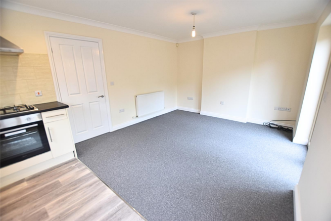 LIVING ROOM WITH OPEN PLAN KITCHEN AREA