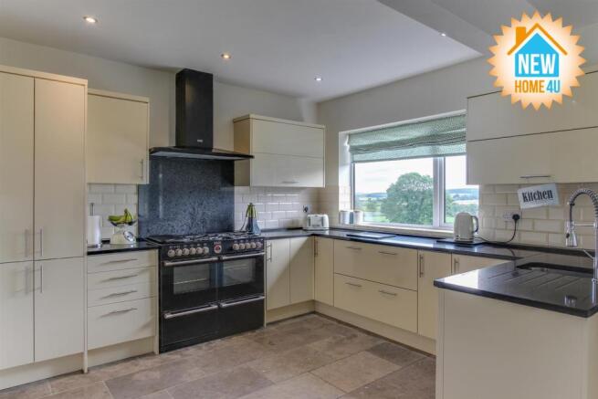 KITCHEN/DINING AREA/ FAMILY ROOM: