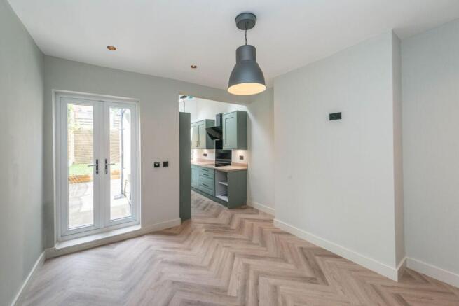 SITTING ROOM DINING ROOM AND KITCHEN