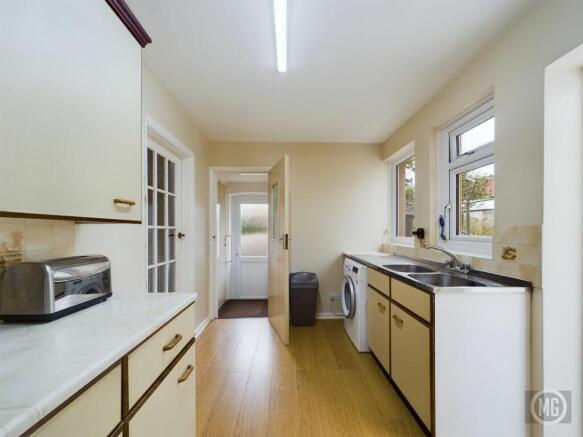 Kitchen leading to Side Hallway