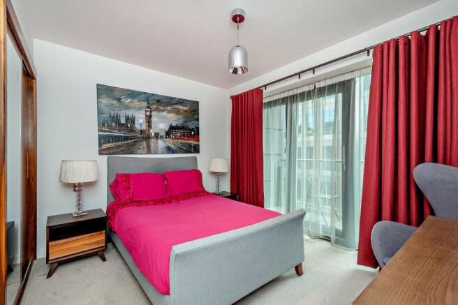 Bedroom With Balcony