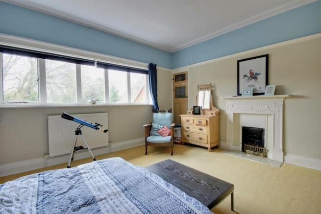 One of six bedrooms