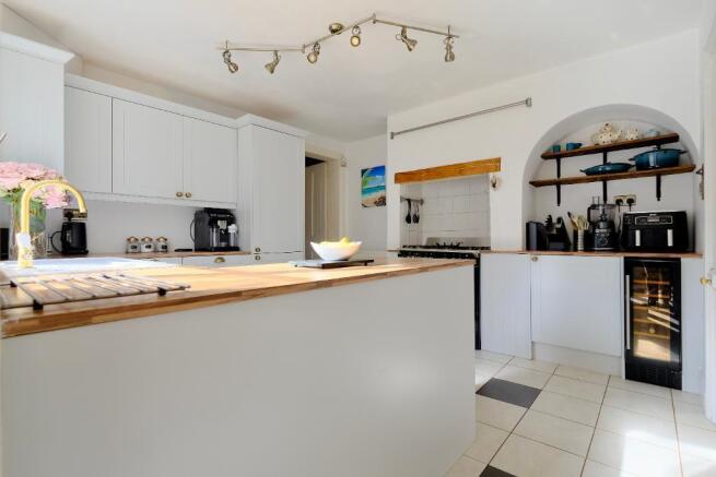 Kitchen plus door to utility & cloakroom