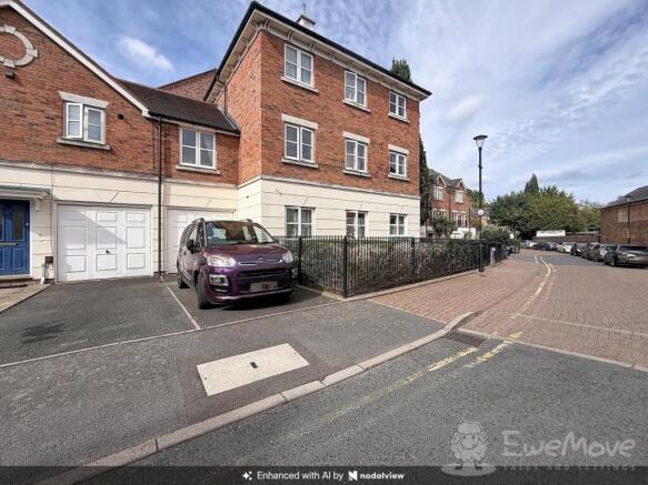 View of Garage and parking space