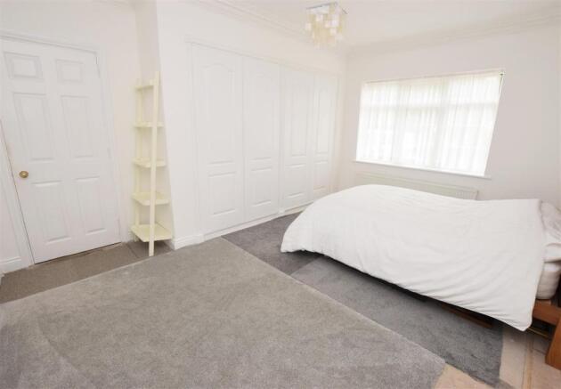 Bedroom three with wardrobes .jpg