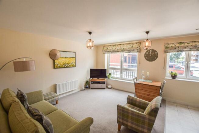 2 Riverbank Court - living room2 (brochure).jpg