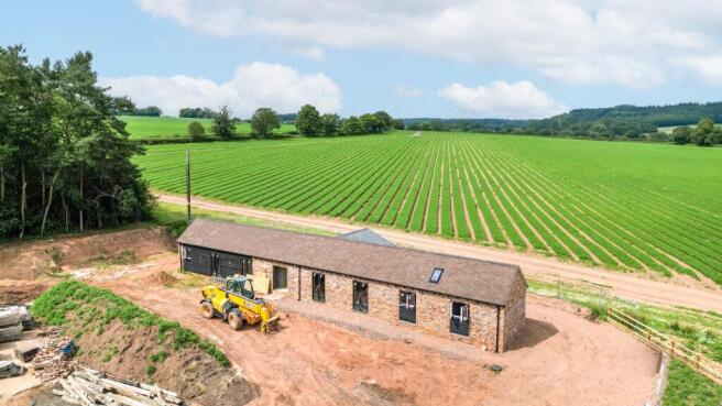 A completed version of one of the barns