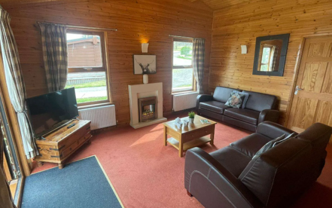 Spacious lodge living room at Watermouth Lodges No