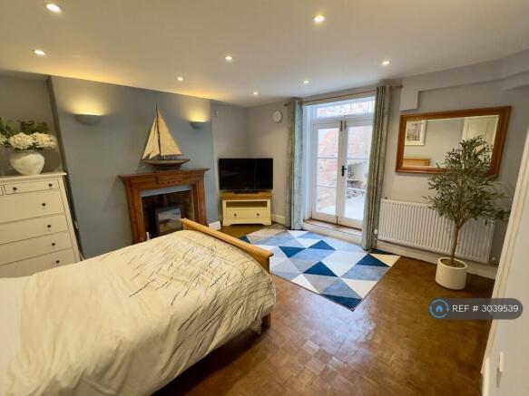 Bright Main Living Area With French Doors