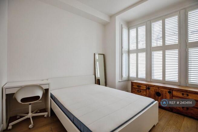Main Bedroom With High Ceilings